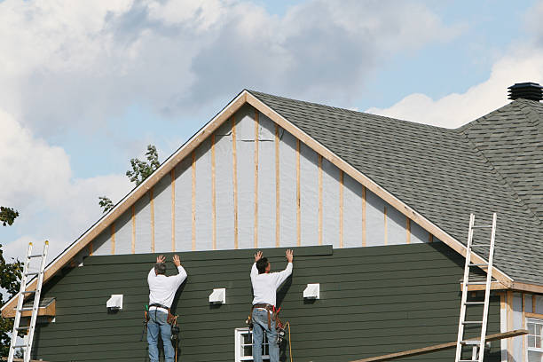 Professional Siding technician working in Fairfax, MN